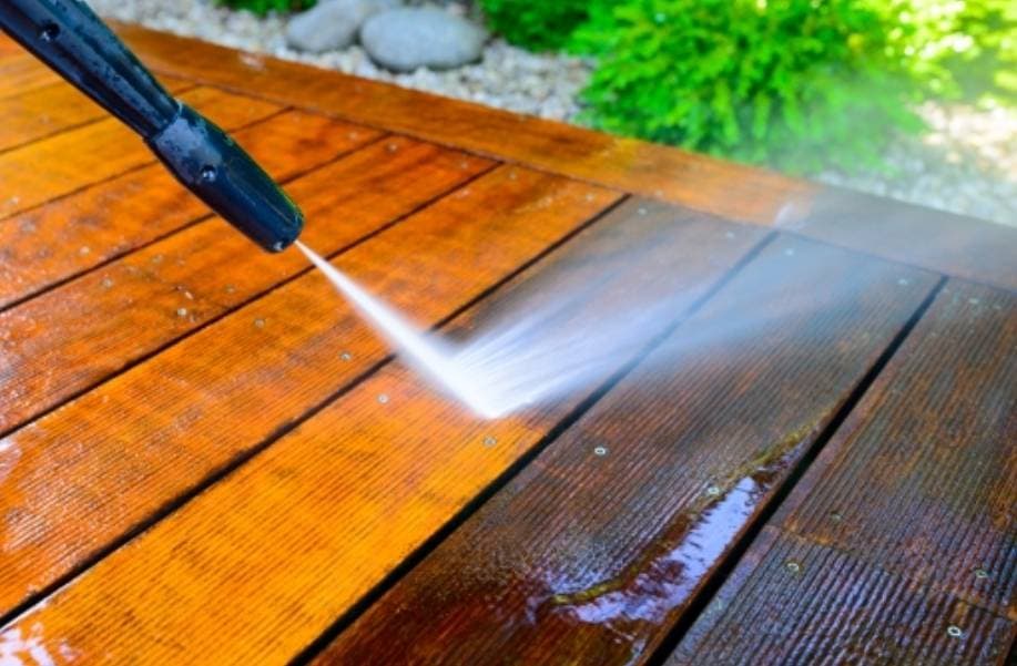 Power washing a deck